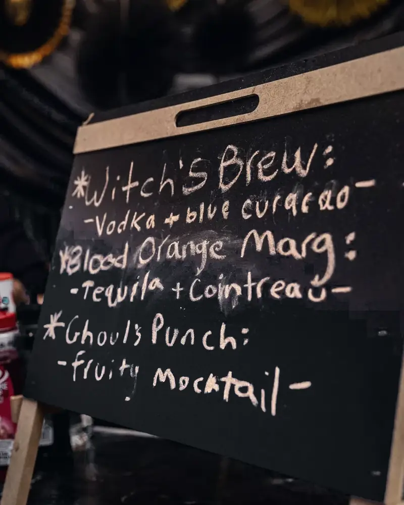 Chalkboard menu with Witch's Brew and Ghoul's Punch