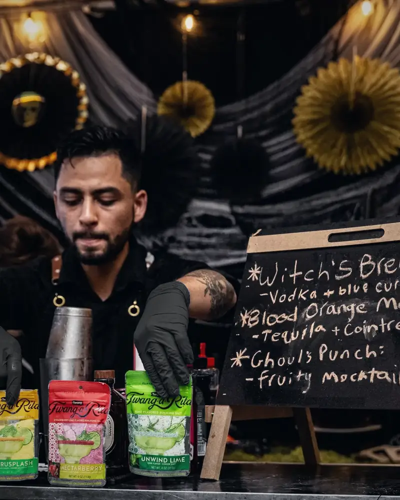 Bartender lining up flavored rimming salts
